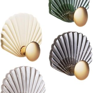 4 shell-shaped self-adhesive wall hooks for keys/storage.