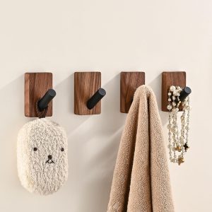 4 walnut wood hooks, adhesive or wall-mounted.